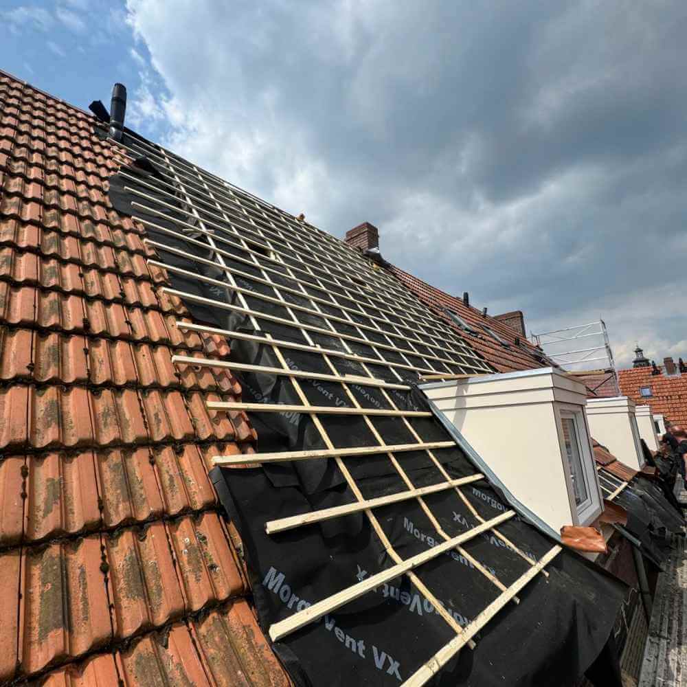 kosten rieten dak vervangen door dakpannen