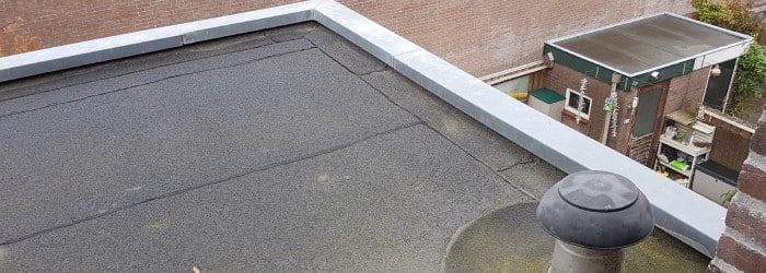 lek plat dak repareren