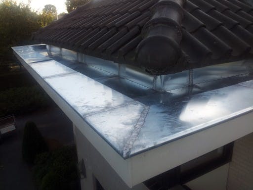 zinken dak repareren