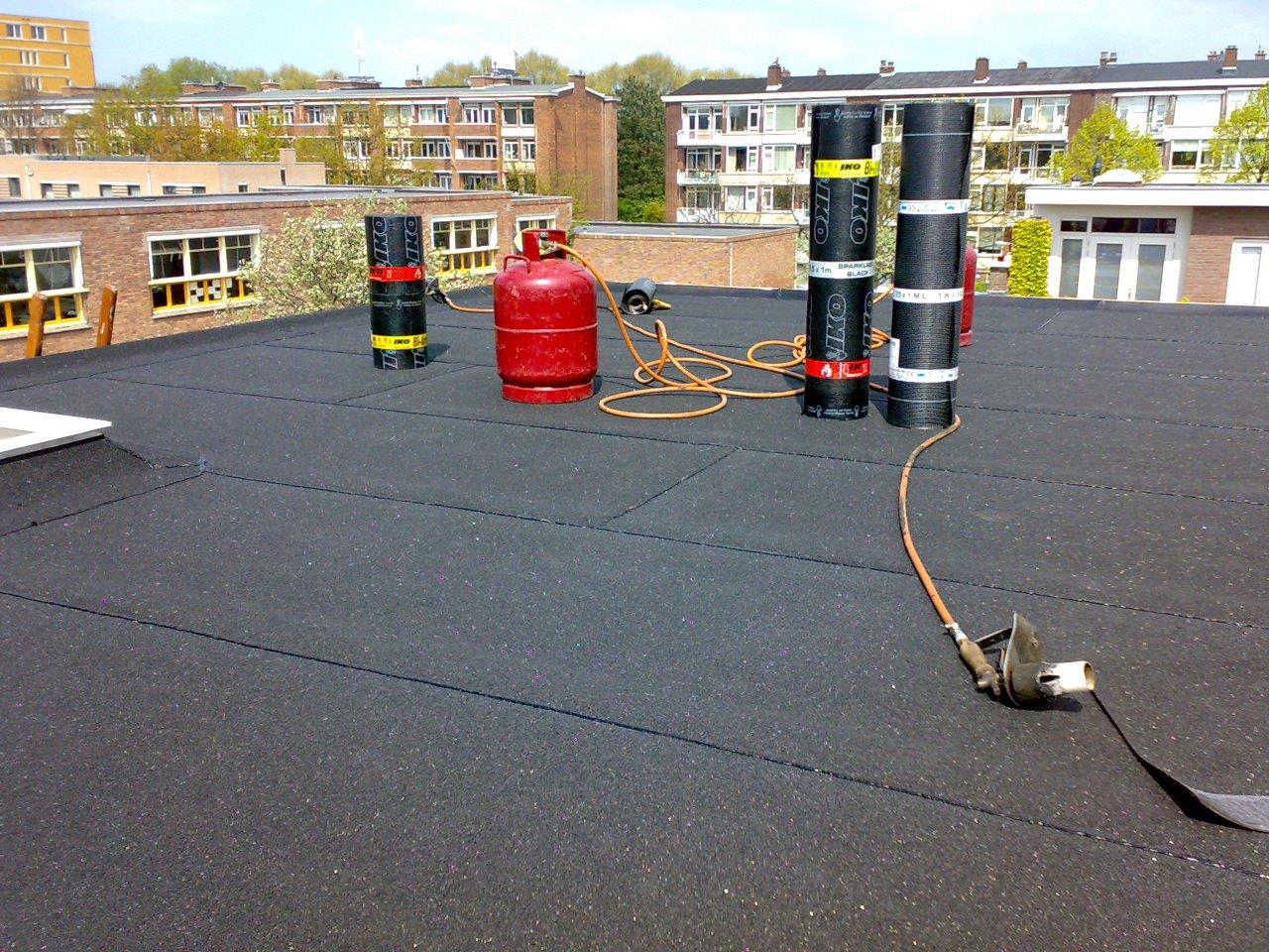 wat kost bitumen dak vervangen